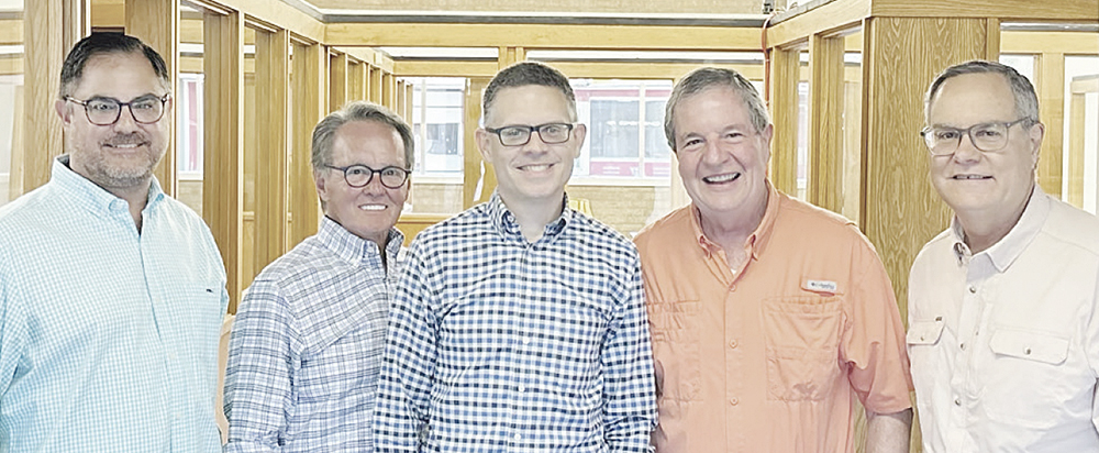Shown during the announcement of the sale are (from left) Jonathan McElvy of Coastal Bend Publishing, LLC; publisher Dennis Wade; new owner Albert Reynolds of South Texas News, Inc.; and previous co-owners Fredrick C. “Chip” Latcham III and George G. “Jeff” Latcham of Beeville Publishing Co., Inc. (Photo by Matt Cain)
