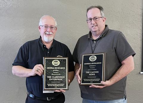 Showing off general excellence awards in the Panhandle Press Association Better Newspaper Contest are Roger Estlack, (left) The Clarendon Enterprise in Division 1; and Tim Ritter, The Canyon News in Division 2. Awards were presented at the 117th Annual Panhandle Press Association convention in Hereford. Contest results are available on the TPA website,  https://www.texaspress.com/sites/texaspress.com/files/file_uploads/PPAContest_0.pdf (Photo by Sue Brown)