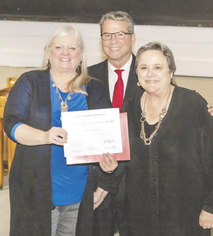 Texas Sen. Charles Perry presented the Texas Historical Commission’s Texas Treasure Business Award to Barbara Brannon (left), editor, and Kay Ellington, publisher of The Texas Spur, which has operated continuously in Dickens County since 1909. (Texas Spur photo by Fred Cervantes)
