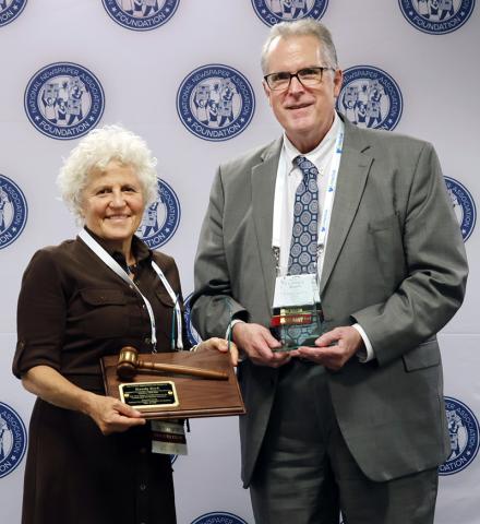 At the recent NNA/NNAF meeting in Detroit, Michigan, outgoing National Newspaper Association Foundation  President Randy Keck received his past president plaque from his successor Jeanne Straus, president and publisher of Straus News, a local media group based in Chester, New York.