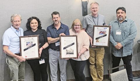 Showing off sweepstakes in their divisions of the South Texas Press Association annual contest are (from left) Craig Garnett and Meghann Garcia, Uvalde Leader-News; Ken Esten Cooke and Kim Grinke Jung, Fredericksburg Standard-Radio Post; and Marc Robertson and Manuel Azocar, Frio-Nueces Current. 