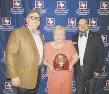 Shown during the presentation of the Lifetime Achievement Award are (from left) Alvin-Manvel Chamber of Commerce Chairman Darren Shelton, Alvin Sun and Advertiser Managing Editor Kathleen Holton and Chamber President and CEO Cary Perrin.