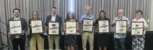 Showing off division sweepstakes awards in the 2024 Texas Better Newspaper Contest are (from left) Nicholas Cicale, Williamson County Sun in Division 3; Kylie Bailey, Graham Leader in Division 4; Ken Cooke, Fredericksburg Standard Radio-Post in Division 5; Abigail Allen, Pilot Point, Post Signal in Division 6; Craig Garnett, Pearsall, Frio-Nueces Current in Division 7; Ana Cosino-Mize, Madisonville Meteor in Division 8; Roger Estlack, Clarendon Enterprise in Division 9; and Nicole Smith, Luling Newsboy and 